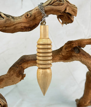 Pendule Djed en bois