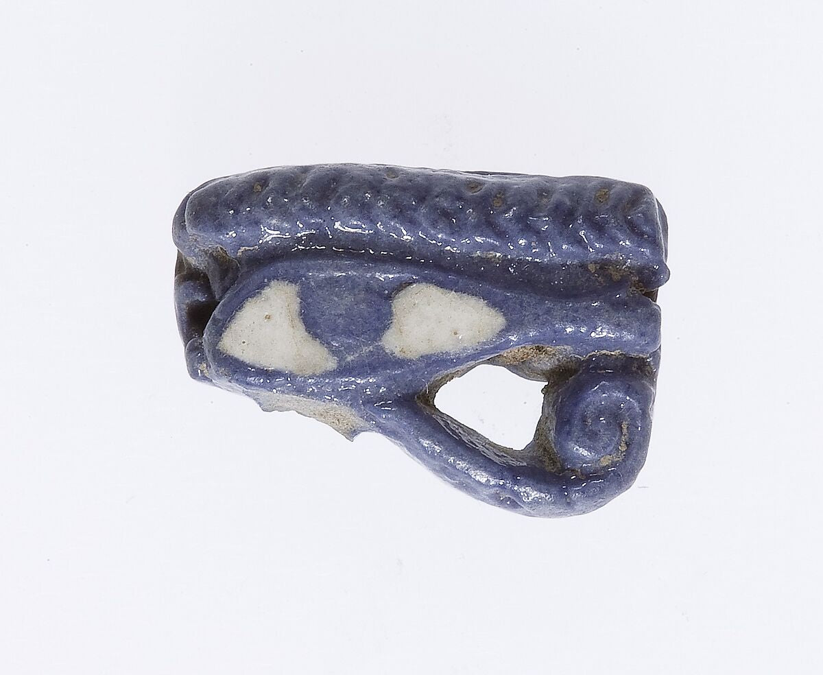 Œil d’Horus ou oudjat : amulette égyptienne du règne d’Amenhotep III, Metropolitan Museum of Art — Aeternum, blog & boutique ésotérique