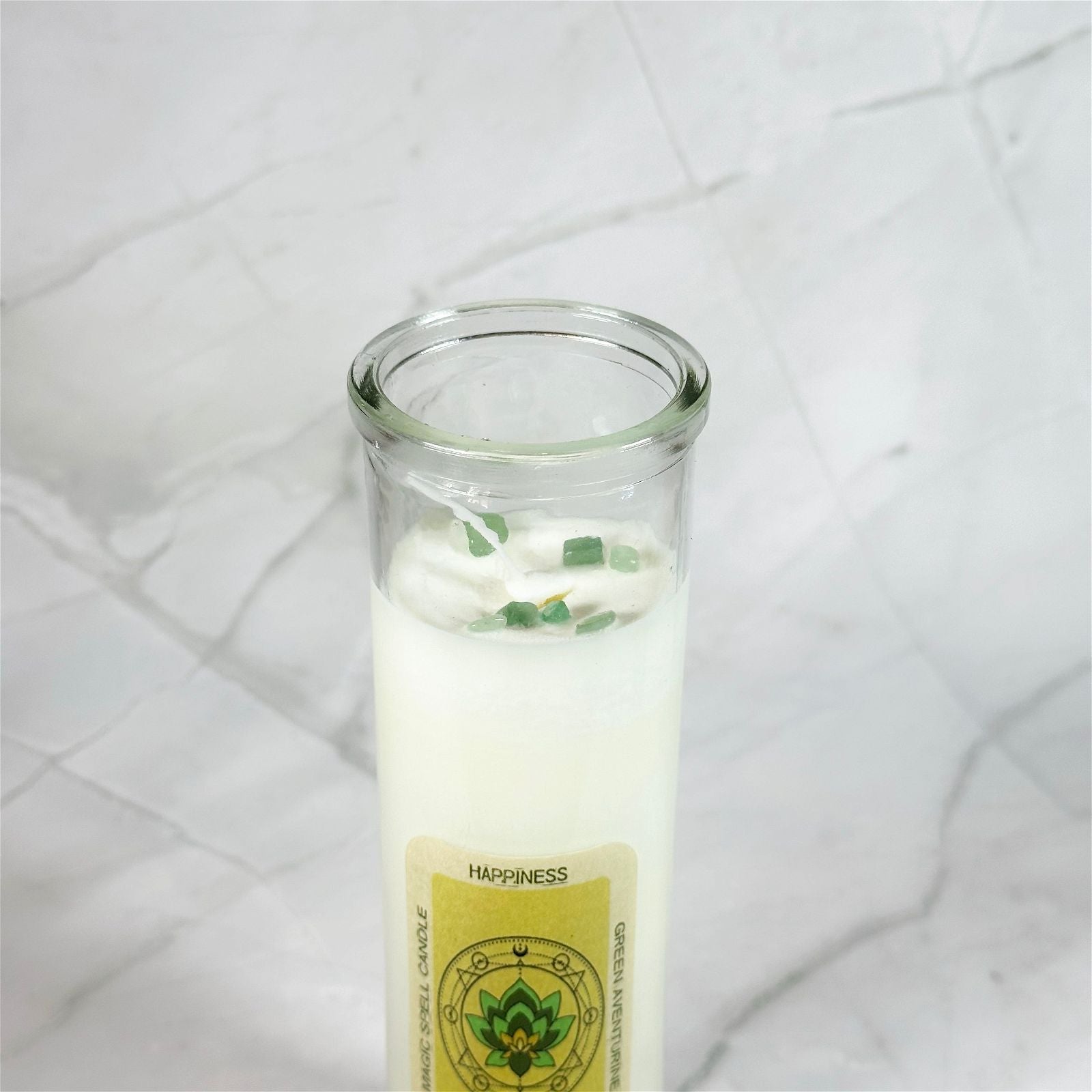 Bougie magique pour le Bonheur - Aeternum - a glass of alcohol sitting on top of a bed  - # boutique ésoterisme# - #wicca# 