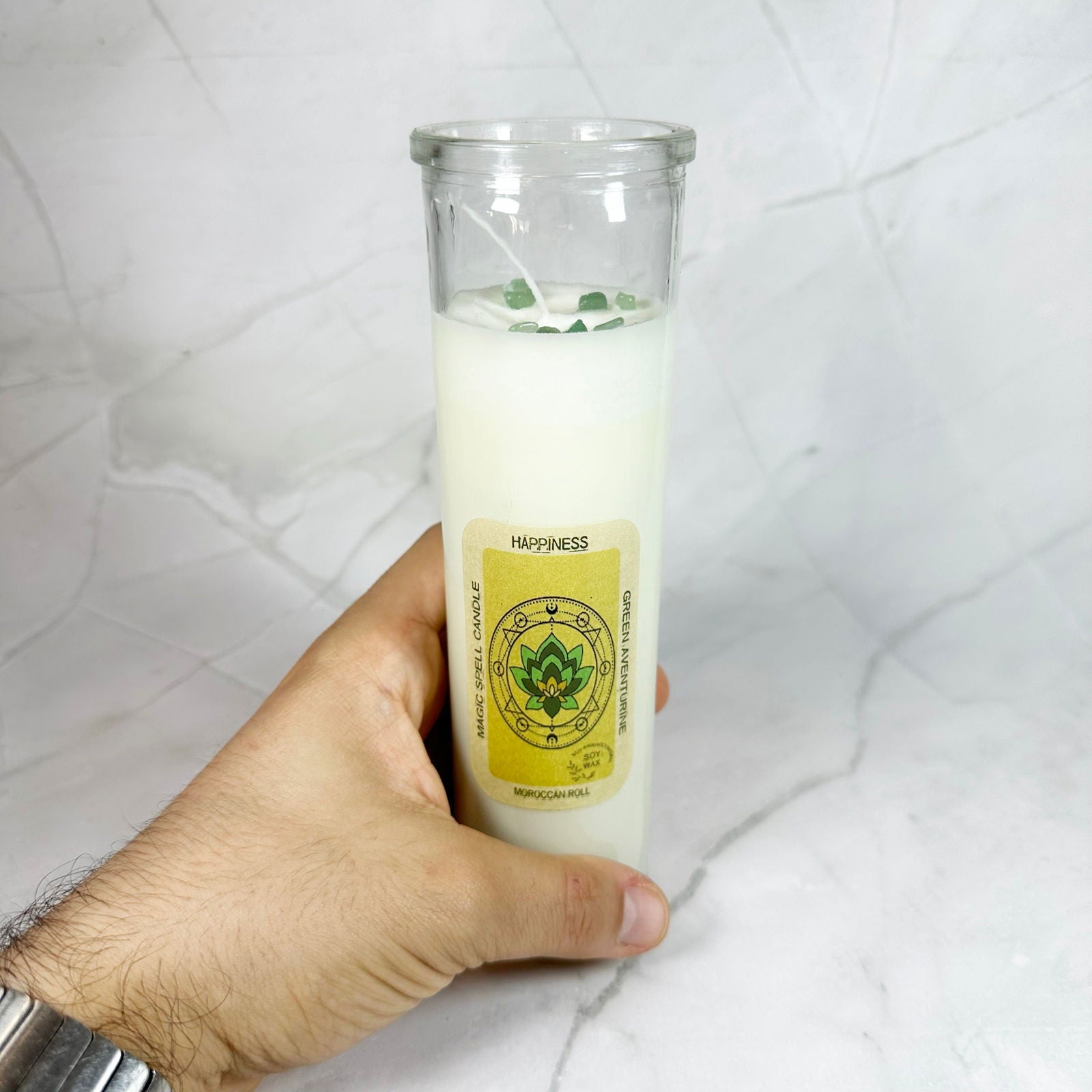 Bougie magique pour le Bonheur - Aeternum - a person holding a can of juice and a drink  - # boutique ésoterisme# - #wicca# 