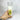 Bougie magique pour le Bonheur - Aeternum - a person holding a can of juice and a drink  - # boutique ésoterisme# - #wicca# 