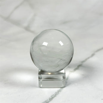 Boule de Cristal avec support (4cm) - Aeternum - a close up of a wine glass in a glass  - # boutique ésoterisme# - #wicca# 
