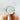 Boule de Cristal avec support (4cm) - Aeternum - a person is holding a glass of wine  - # boutique ésoterisme# - #wicca# 