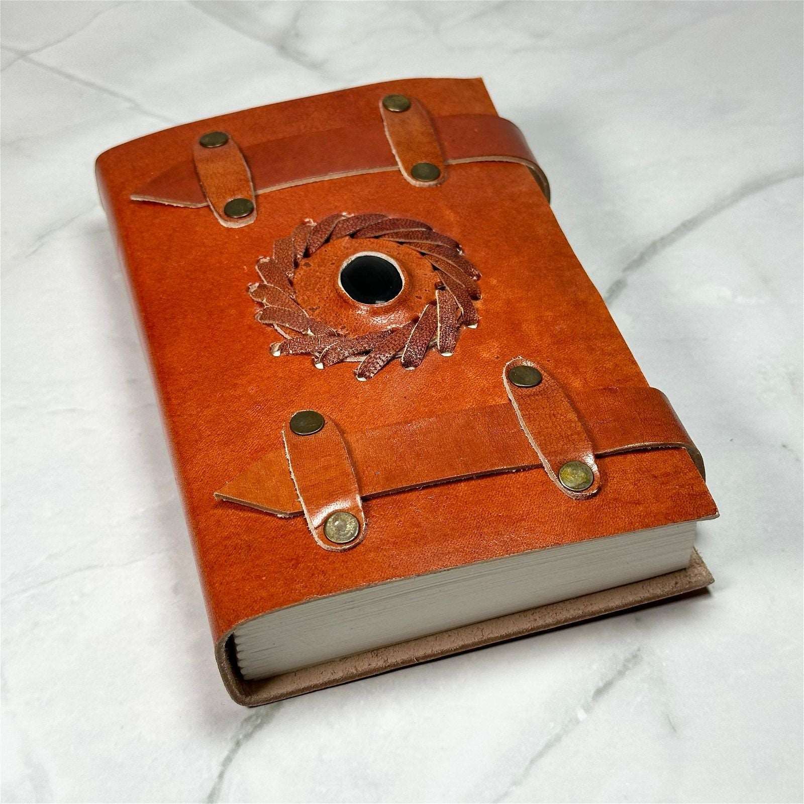 Carnet en cuir et Onyx Noire - Aeternum - Carnet en cuir et Onyx Noire - Aeternum - a red suitcase sitting on a white surface  - # boutique ésoterisme# - #wicca#  - # boutique ésoterisme# - #wicca# 