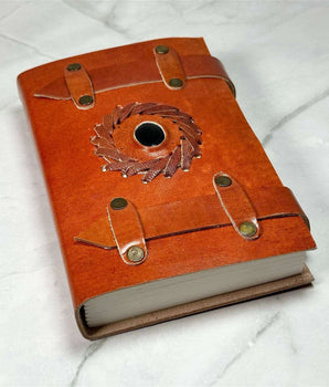 Carnet en cuir et Onyx Noire - Aeternum - Carnet en cuir et Onyx Noire - Aeternum - a red suitcase sitting on a white surface  - # boutique ésoterisme# - #wicca#  - # boutique ésoterisme# - #wicca# 