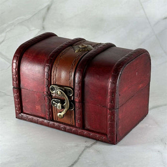 Coffret en bois Trésor - Aeternum - Coffret en bois Trésor - Aeternum - a close up of a red suitcase on the ground  - # boutique ésoterisme# - #wicca#  - # boutique ésoterisme# - #wicca# 