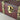 Coffret en bois carré - Aeternum - Coffret en bois carré - Aeternum - a yellow and black clock on the side of a building  - # boutique ésoterisme# - #wicca#  - # boutique ésoterisme# - #wicca# 