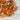 Éclats bruts de Calcite Orange - Aeternum - Éclats bruts de Calcite Orange - Aeternum - a close up of a bunch of doughnuts  - # boutique ésoterisme# - #wicca#  - # boutique ésoterisme# - #wicca# 