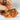 Éclats bruts de Calcite Orange - Aeternum - Éclats bruts de Calcite Orange - Aeternum - a close up of a person holding a doughnut  - # boutique ésoterisme# - #wicca#  - # boutique ésoterisme# - #wicca# 