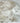Éclats bruts de Cristal de Roche - Aeternum - Éclats bruts de Cristal de Roche - Aeternum - a close up of a piece of fruit  - # boutique ésoterisme# - #wicca#  - # boutique ésoterisme# - #wicca# 