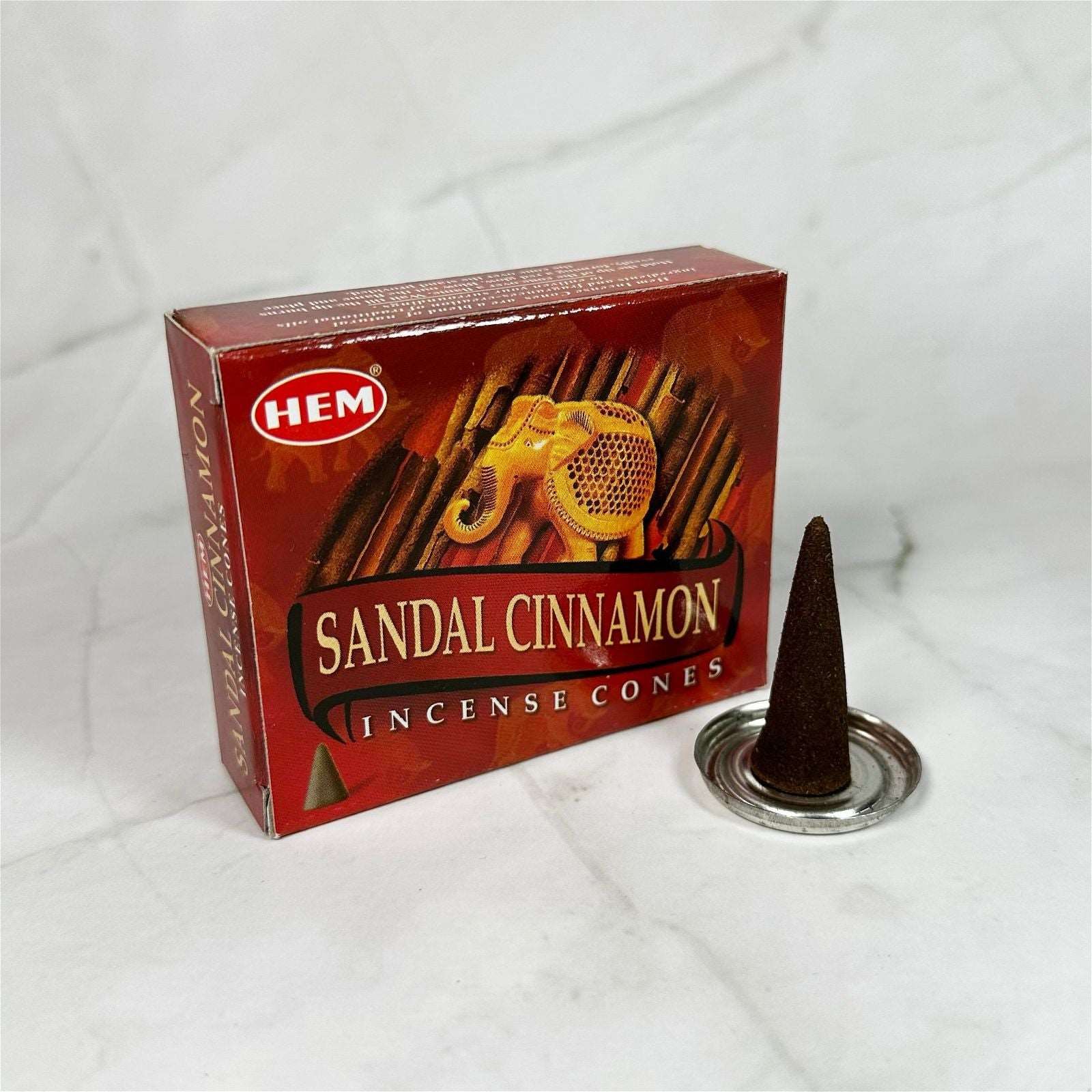 Encens en cônes Santal & Cannelle - Aeternum - Encens en cônes Santal & Cannelle - Aeternum - a sign that is on a white wall  - # boutique ésoterisme# - #wicca#  - # boutique ésoterisme# - #wicca# 