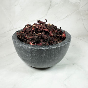 Hibiscus (fleurs) - Aeternum - a close up of a pot on a white surface  - # boutique ésoterisme# - #wicca# 