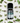 Huile essentielle de Menthe des Champs - Aeternum - a bottle of wine and a plant in a vase  - # boutique ésoterisme# - #wicca# 