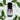 Huile essentielle de Niaouli - Aeternum - a bottle of wine and a plant on a table  - # boutique ésoterisme# - #wicca# 