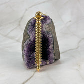 Pendule d'Isis long en laiton